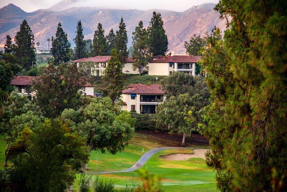 Charming villas surrounded by lush greenery & mountains in Escondido, California.